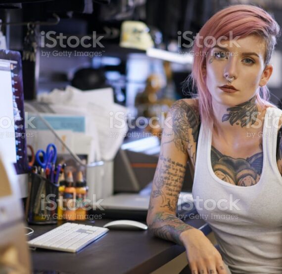 Shot of a tattoo artist at work