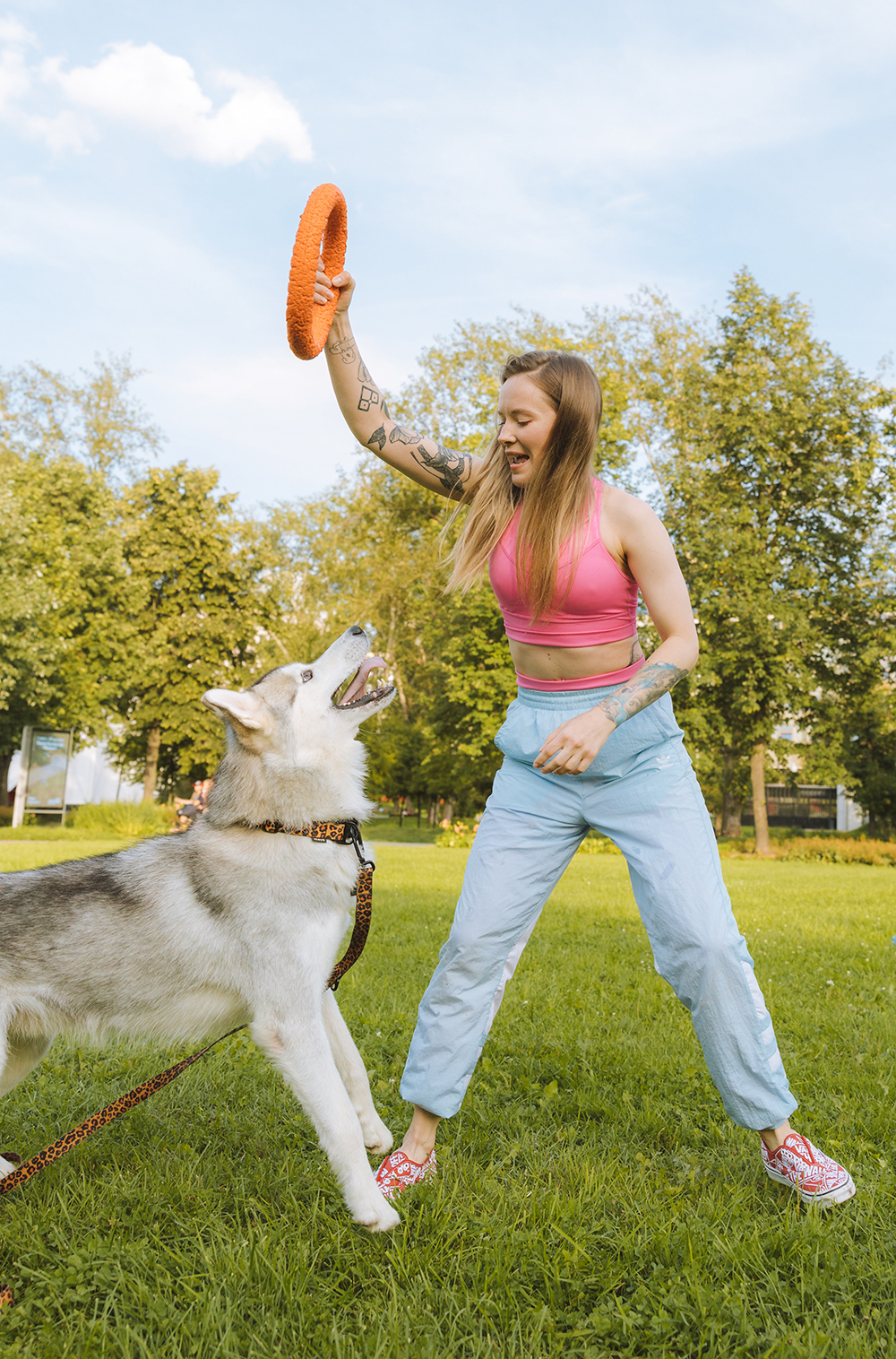 Woman Playing With Dog